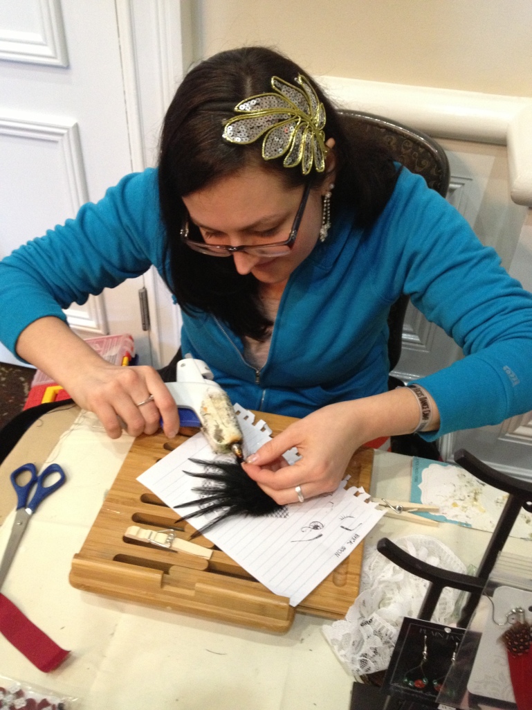 Zoe hard at work on a feathered piece.